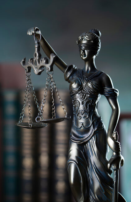 Lawyer office. Law symbols composition: judgeaEUR(TM)s gavel, Themis sculpture, scale and legal books.