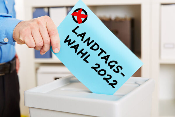 Hand when voting for the Bundestagswahl (German for: Federal Parliament election) in 2021 at a ballot box