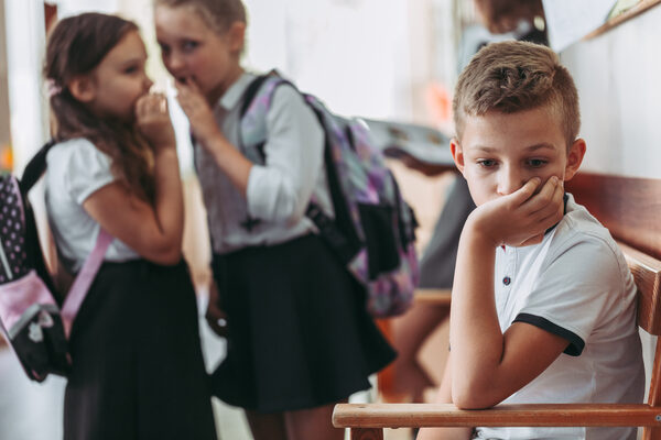 Girls gossiping about boy