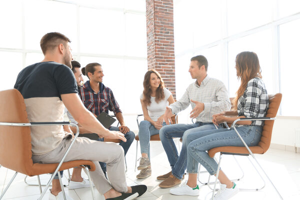 employees sitting in class for team building